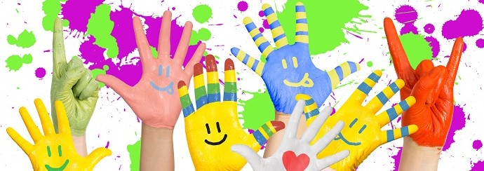 painted children's hands in different colors with smilies